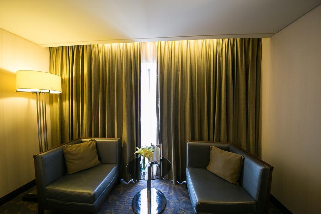 Evergreen Plaza Hotel - Tainan Quarto foto A room at the hotel
